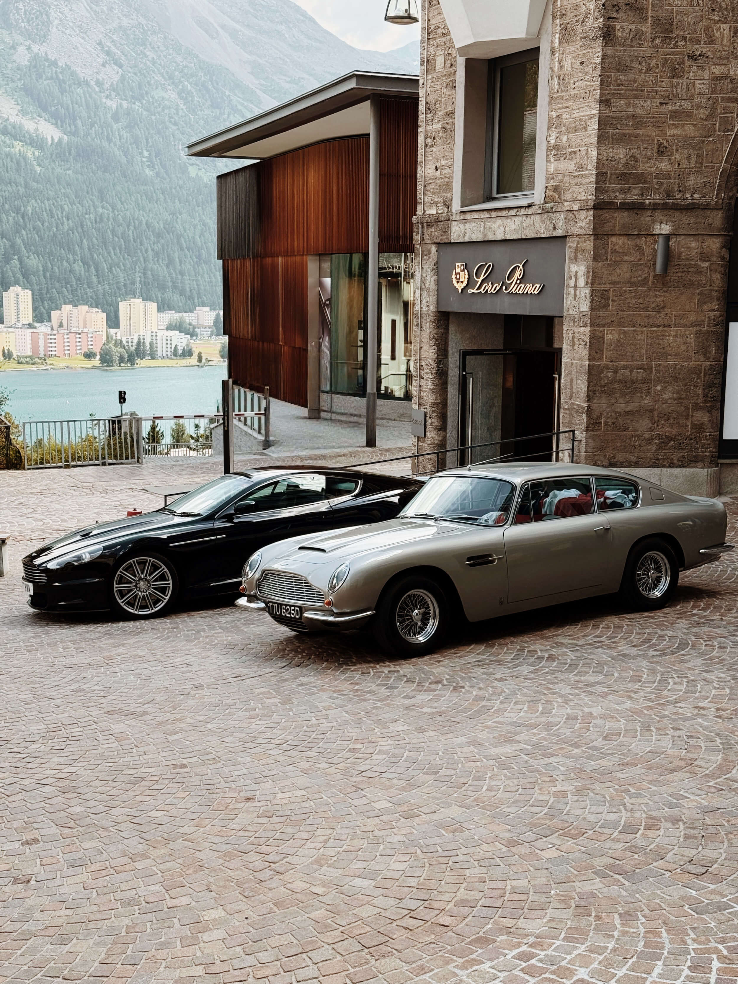 Old and new(er) Aston Martin outside Loro Piana