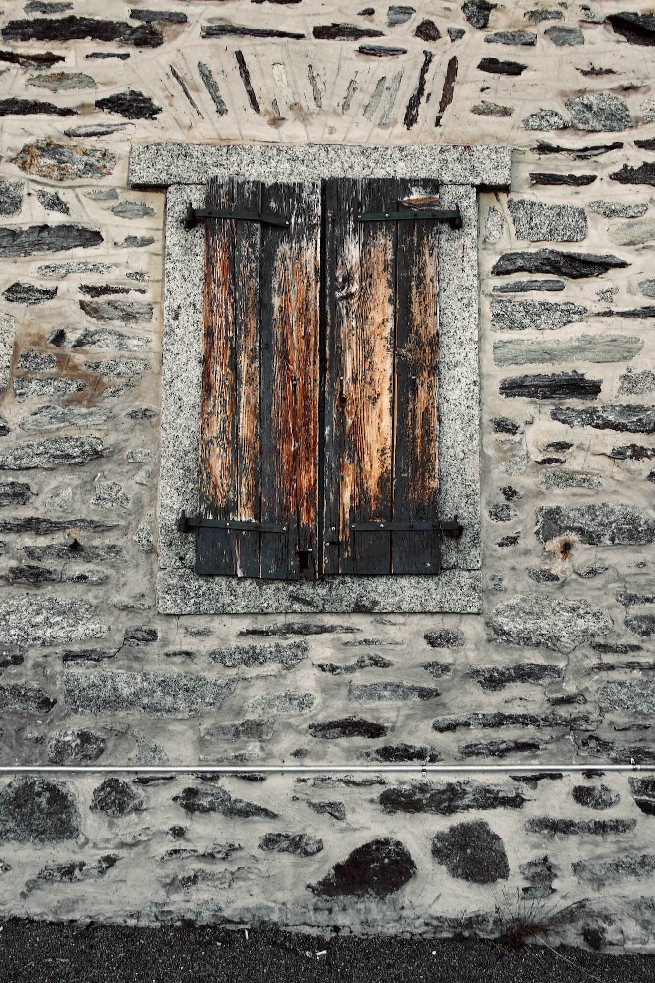 Doorway to an abandoned buildings on the Furka Pass
