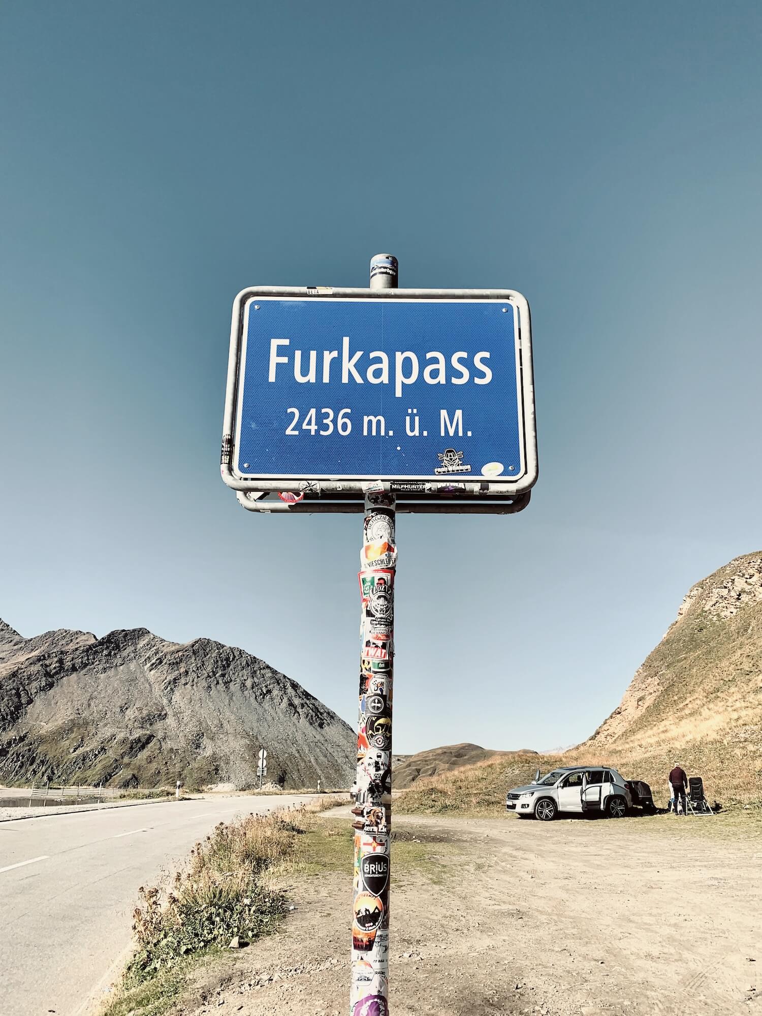 The sign marking the summit of the Furka Pass
